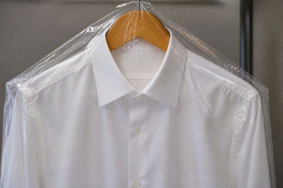 A pressed shirt sealed in a cover, the final step in how long dry cleaning takes in Sydney